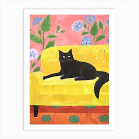Black Cat Sitting In A Yellow Armchair Art Print