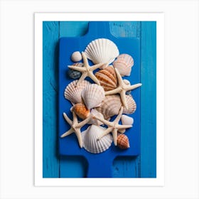 Sea Shells On A Blue Cutting Board Art Print