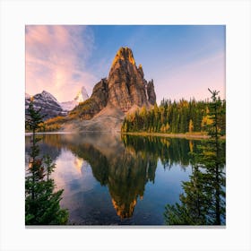 Scenery of sunburst lake and mount Assiniboine reflections between pine tree at sunrise, Sunrise At Mt Canvas Print