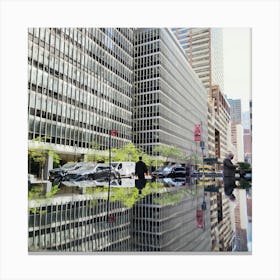 Reflection Of Buildings Canvas Print