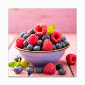 A Bowl Fruits With Raspberries And Blueberries On A Rustic Pink Wooden Background Canvas Print