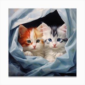 Two Kittens Peeking Out Of Blue Cloth Canvas Print