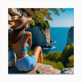 Woman Sitting On Cliff Overlooking Sea Canvas Print