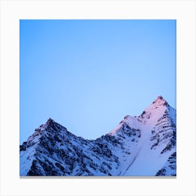 A Snow Covered Mountain Peak Glistening In The Pale Light Of Dawn With A Lone Eagle Soaring Majest Canvas Print