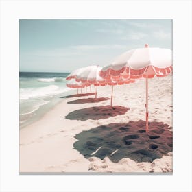 Pink Umbrellas On The Beach Canvas Print