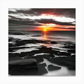 Sunset Over A Rocky Shore Canvas Print