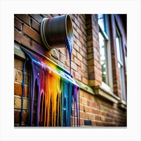 A metal bucket with colorful paint dripping down a brick wall. Canvas Print