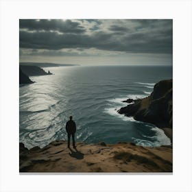 Man Standing On Cliff Overlooking Sea Canvas Print