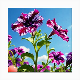 Purple Flowers Against A Blue Sky Canvas Print