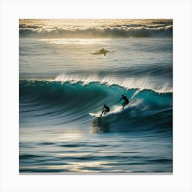 Two Surfers Riding A Wave Canvas Print