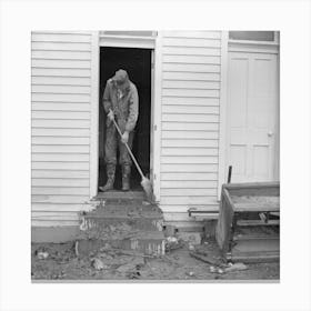 Man Sweeping Mud Off The Front Steps Of His House After Flood, Posey County, Indiana By Russell Lee Canvas Print