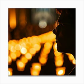 Silhouette Of A Person In Front Of Candles Canvas Print