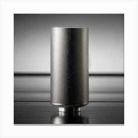 Black Cylinder On A Table Canvas Print