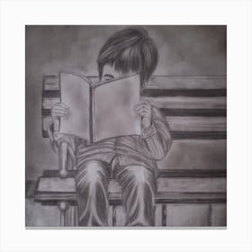 Boy Reading A Book Canvas Print