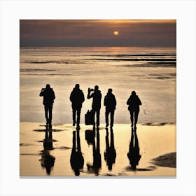 Silhouettes Of People On The Beach Canvas Print