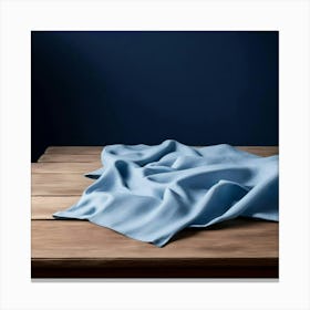 Blue Cloth On A Wooden Table Canvas Print