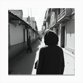 Woman Walking Down A Street Canvas Print