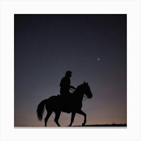 Silhouette Of A Cowboy Riding His Horse Canvas Print