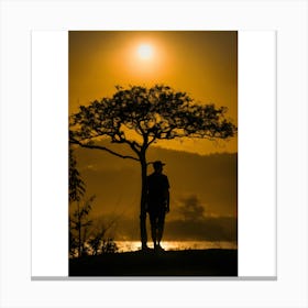 Silhouette Of A Man At Sunset Canvas Print