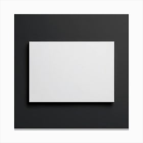 Blank White Poster On A Black Wall Canvas Print