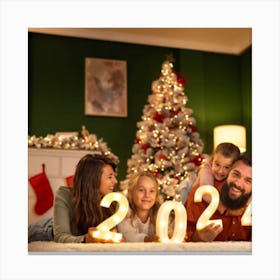 Family In Front Of A Christmas Tree Canvas Print