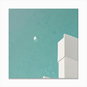 White Building With Blue Sky Canvas Print