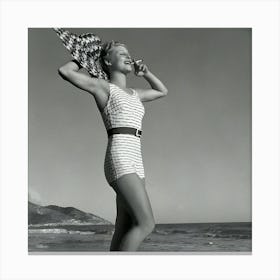 Blonde Beauty In Her Bathing Suit On The Beach Pleasurably Smoking A Cigarette Canvas Print