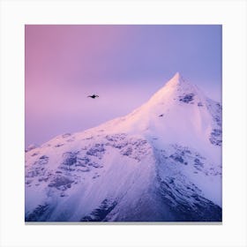 A Snow Covered Mountain Peak Glistening In The Pale Light Of Dawn With A Lone Eagle Soaring Majest (2) Canvas Print