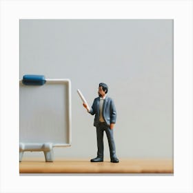 Businessman Holding A Whiteboard Canvas Print