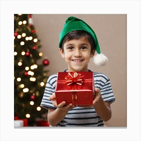 Boy Holding Christmas Gift Canvas Print