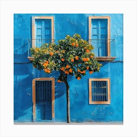 Orange Tree In Front Of Blue House Canvas Print