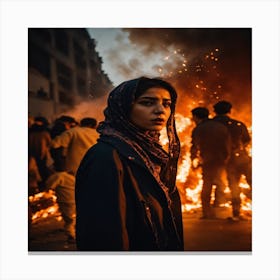 Woman In Front Of A Fire Canvas Print