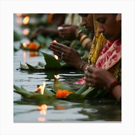 Women Lighting Candles In The Water Canvas Print