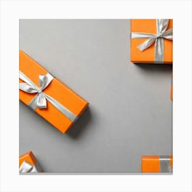 Orange Gift Box On A Plain Silver Background Canvas Print