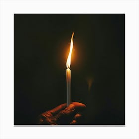 Hand Holding A Lit Candle Canvas Print