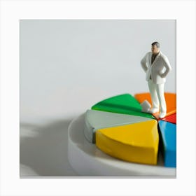 Businessman On A Pie Chart Canvas Print