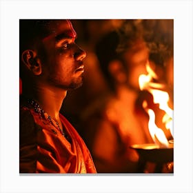 Hindu Man Lighting A Lamp Canvas Print