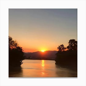 Sunset Over The River Canvas Print