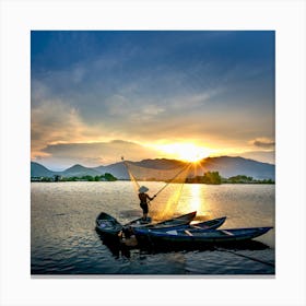 A fisherman enjoué the sunset on the sea Canvas Print