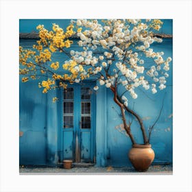 Tree In Front Of Blue House Canvas Print