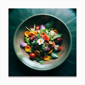 A close-up shot of a salad with colorful flowers and vegetables. Canvas Print