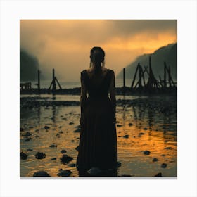 Woman Standing In Water At Sunset Canvas Print