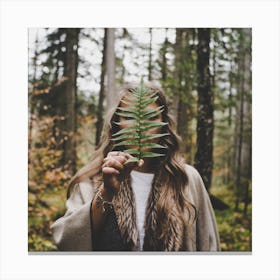 Woman Holding A Leaf In The Forest Canvas Print