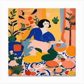 Woman In A Kitchen Canvas Print