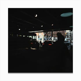 Silhouette Of A Man Walking Under A Bridge Canvas Print