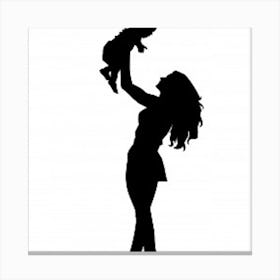 Silhouette Of A Woman Holding A Baby Canvas Print