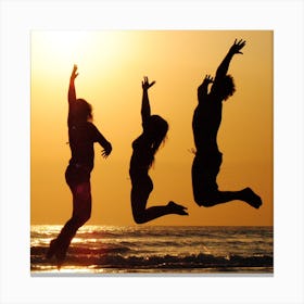 Silhouette Of Friends Jumping At Sunset Canvas Print