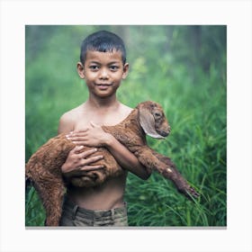 Boy Holding A Goat Canvas Print