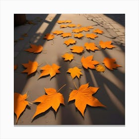 Several Bright Orange Maple Leaves Arranged On A Grey Pavement, With Long Shadows Cast By Sunlight Canvas Print