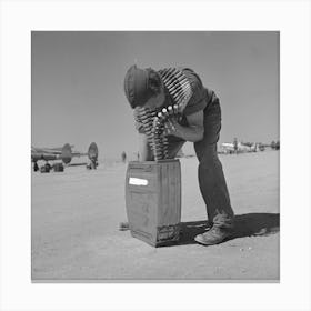 Armorer Placing Fifty Caliber Machine Gun Bullets In Magazine, Lake Muroc, California By Russell Lee Canvas Print